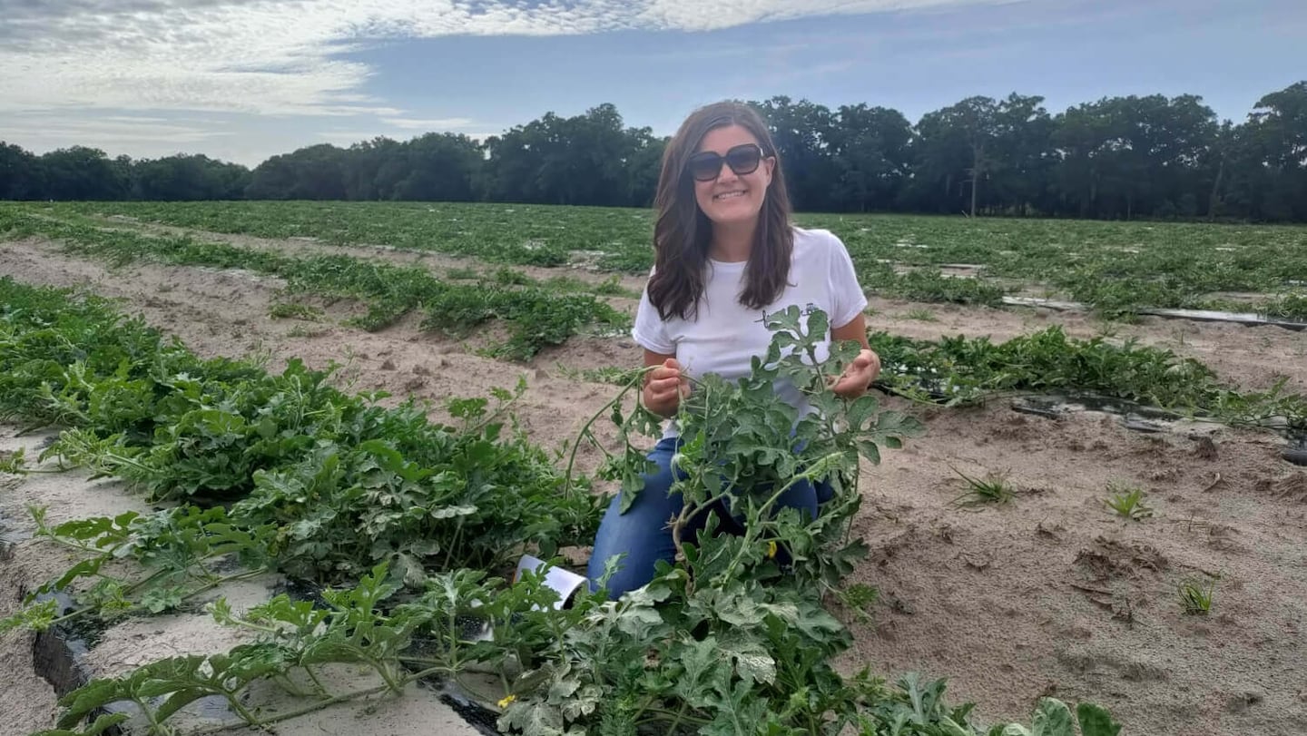Michelle Miller in a watermelon field.